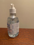 8oz bottle of Aqua sanitizer