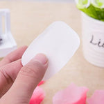 paper soap sheet in hand